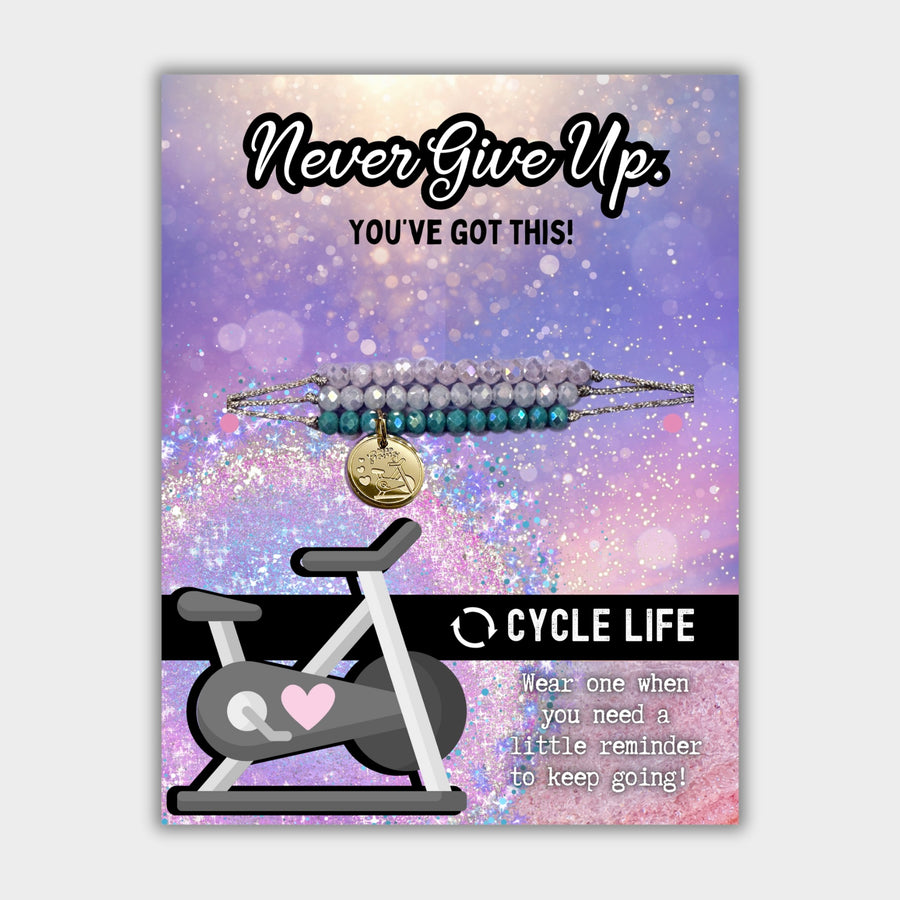 Cycle Life Charm Bracelet Set with 14K Gold plated 'Keep Going Cycle' charm, the Perfect little something.