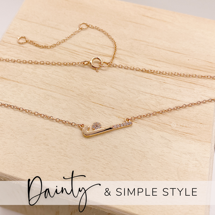 Dainty .925 Sterling Silver Field Hockey Necklace with premium cubic zirconias in a pavé setting.