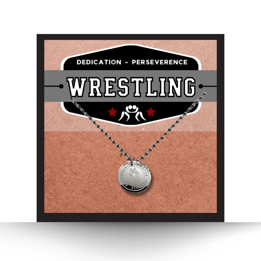 16MM Wrestling disc charm necklace.
Dedication - Strength - Perseverance