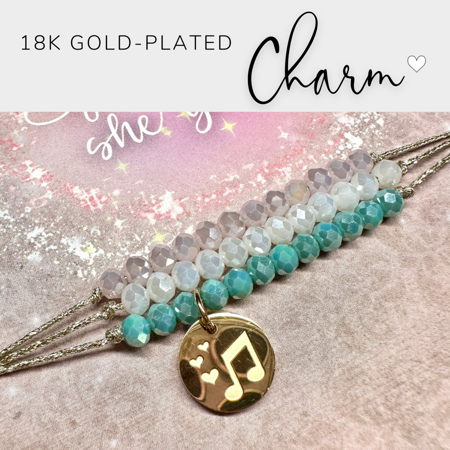 Bracelet with 18K Gold pated charm.