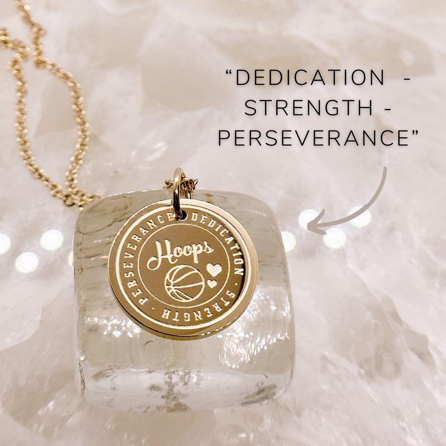 Basketball disc charm - dedication - strength - perseverance.