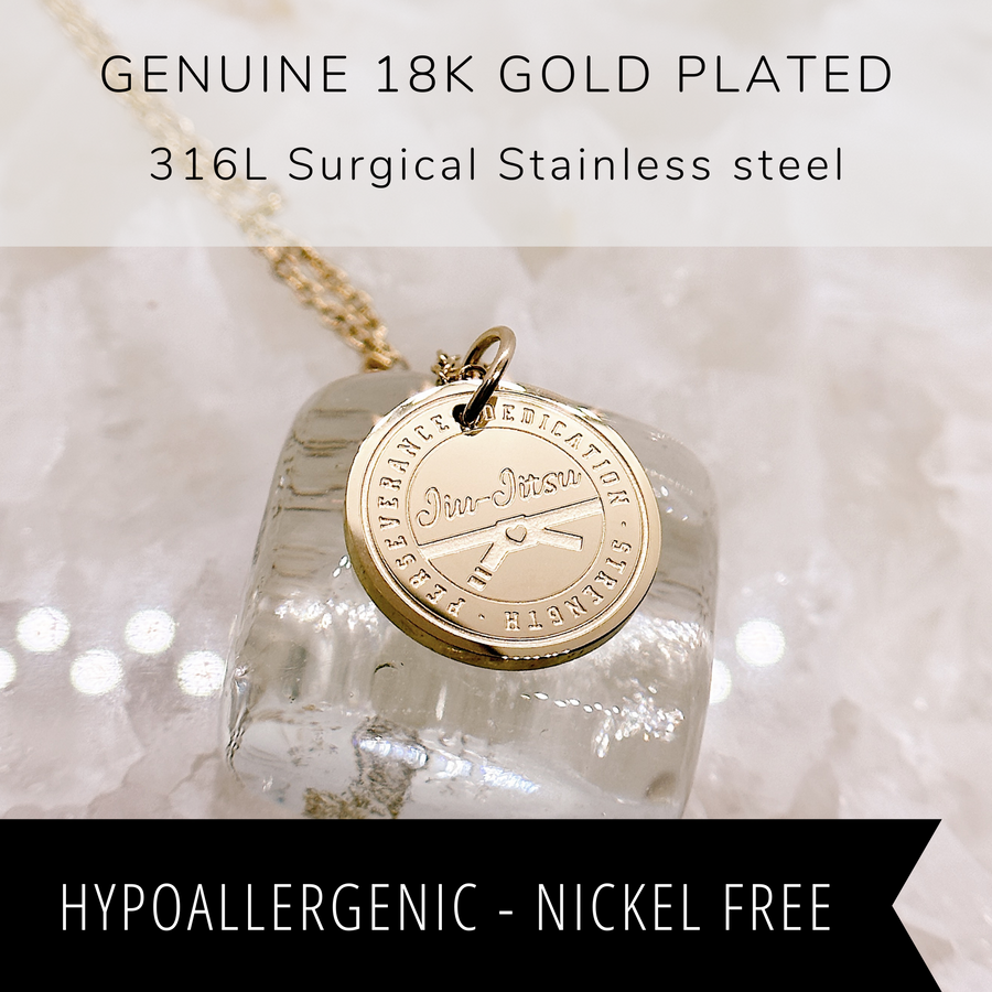 18K gold plated jiu jitsu disc charm necklace.