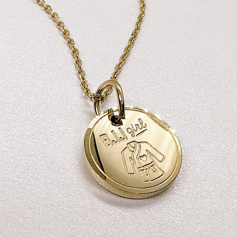 BJJ Necklace shown in gold finish. Gift for jiu-jitsu women and girls.
