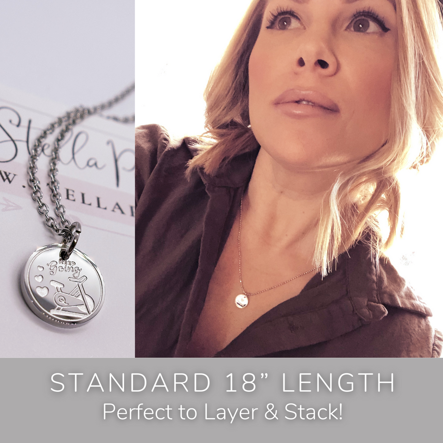 Model wearing stackable disc charm necklace. Perfect to Layer and Stack!