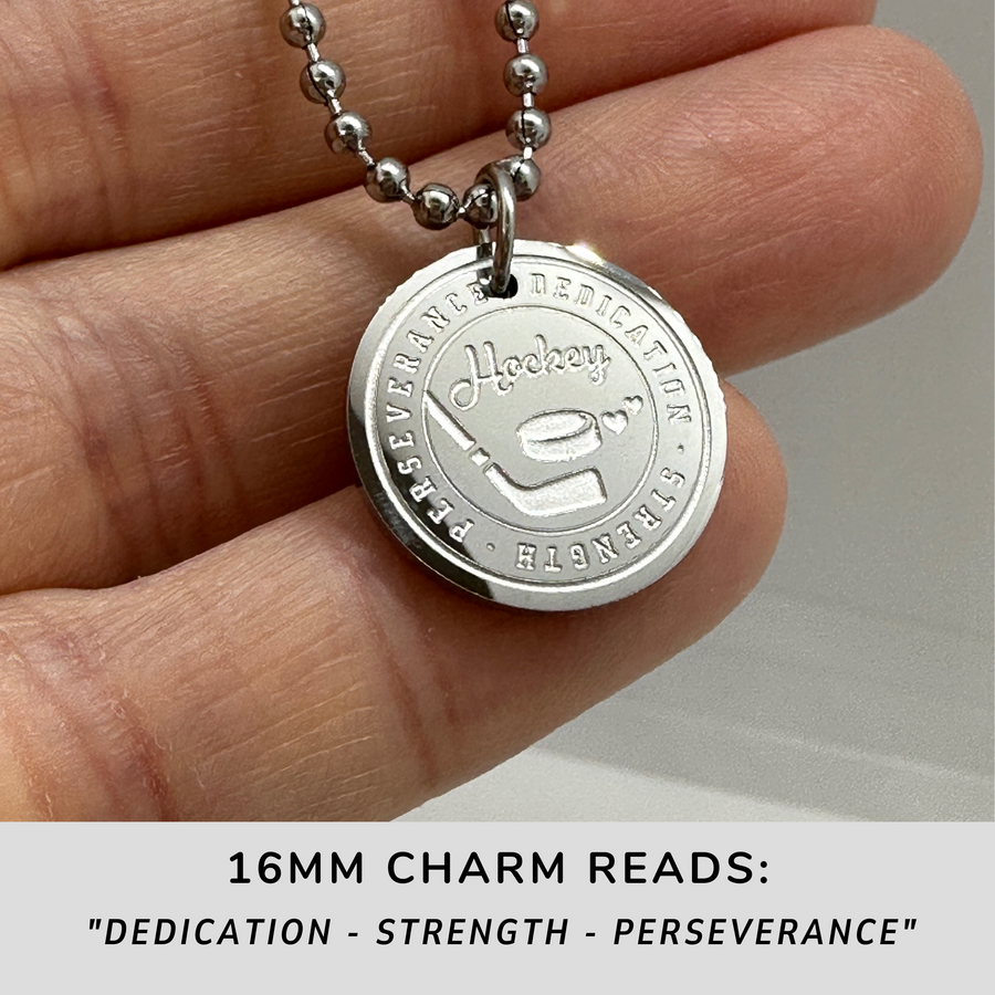 16MM Hockey disc charm necklace.
Dedication - Strength - Perseverance