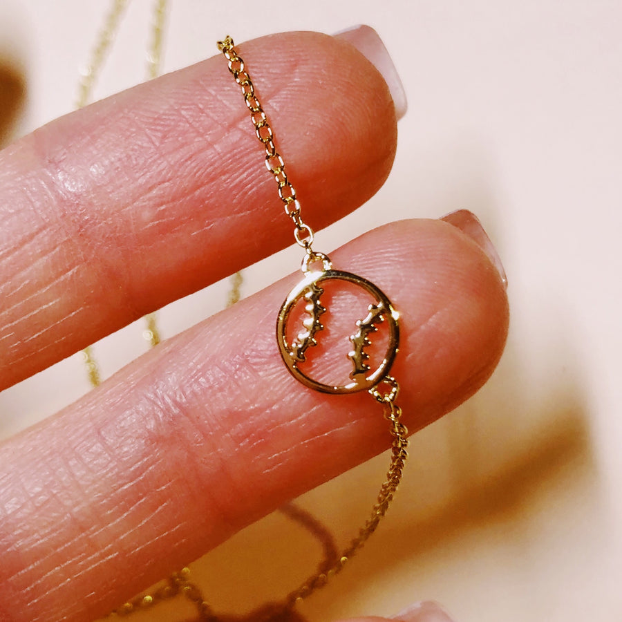 Tiny .925 silver Softball Necklace in gold.
