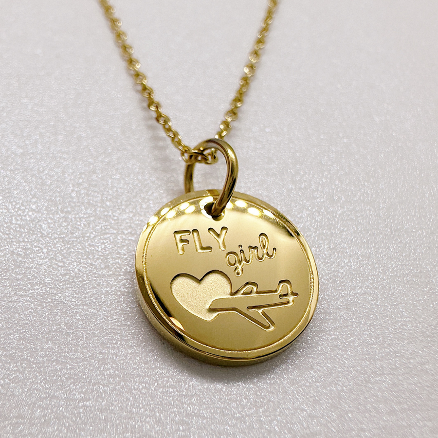 Airplane necklace in gold. Gift for flight attendant or female pilot.