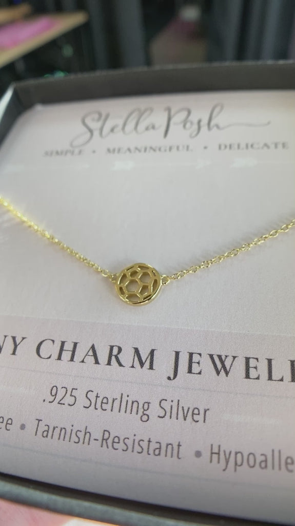 Tiny .925 silver Soccer Ball Necklace in gold., mounted on quality card and boxed for gifting.
