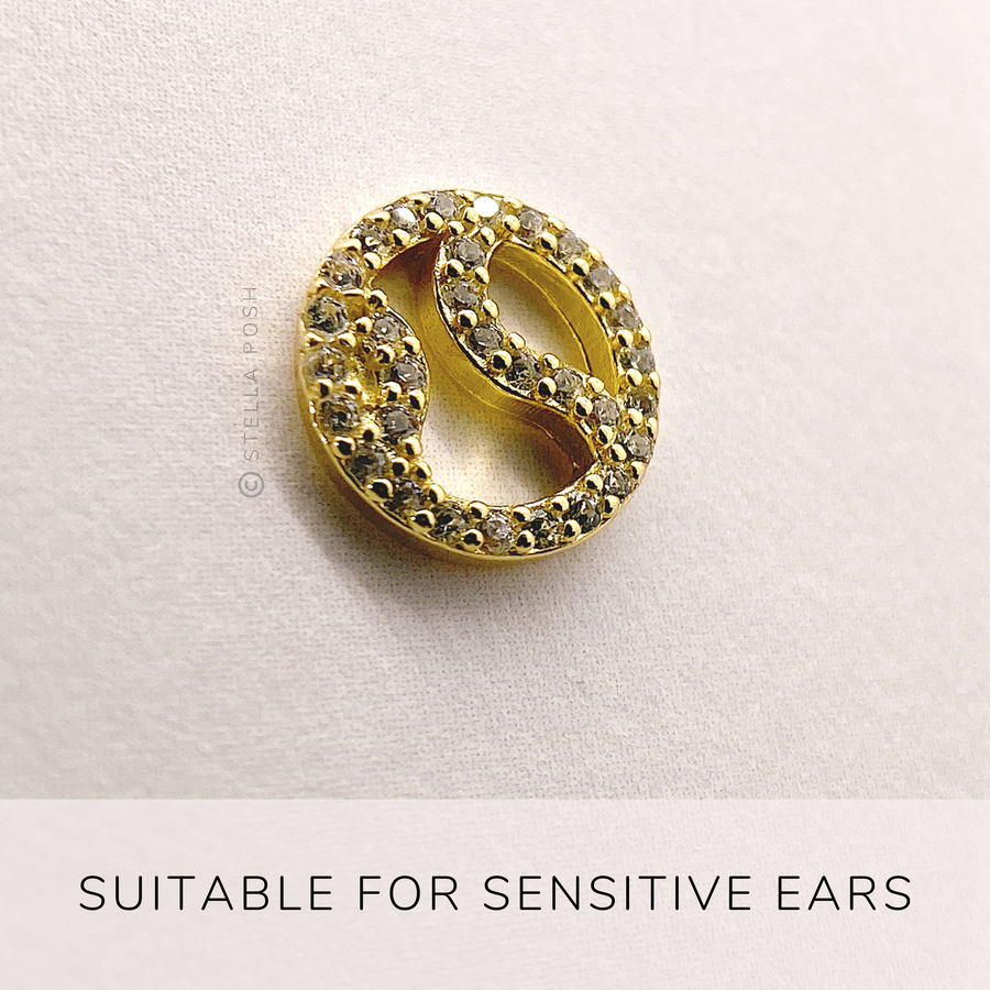 Tiny .925 Sterling Silver Tennis earring with premium cubic zirconia stones in a pavé setting in gold, suitable for sensitive ears.