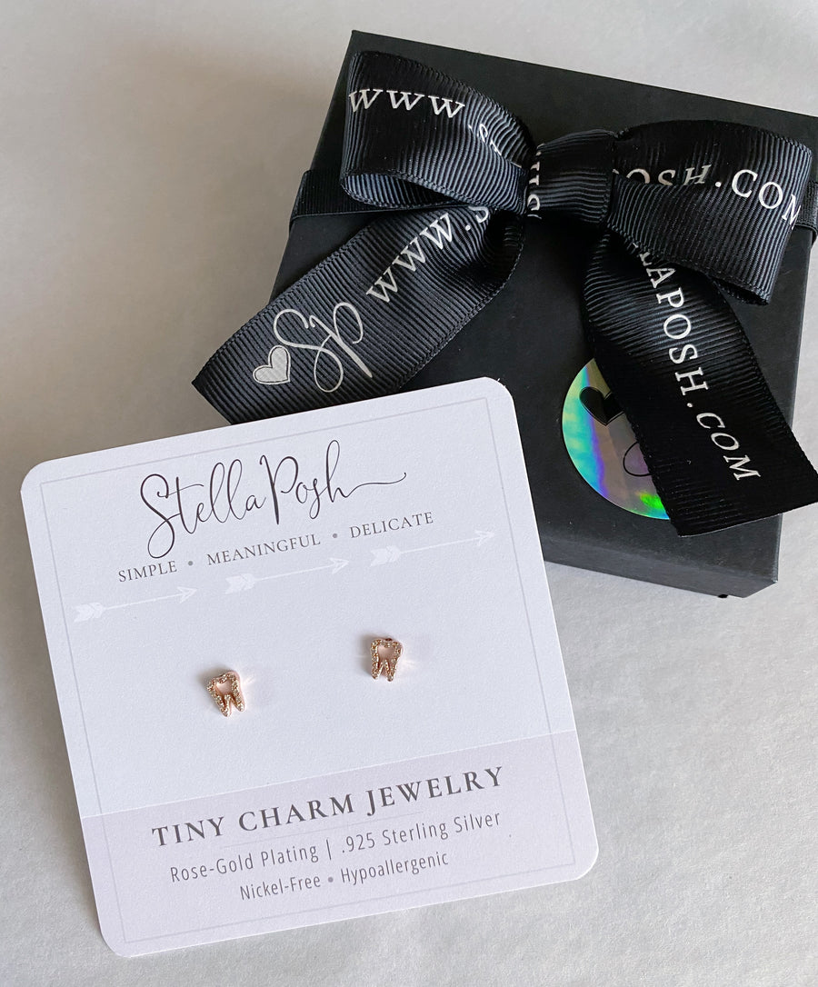 Tiny .925 Sterling Silver Tooth Earrings with premium cubic zirconia stones in a pavé setting, mounted on a premium card with gift packaging.