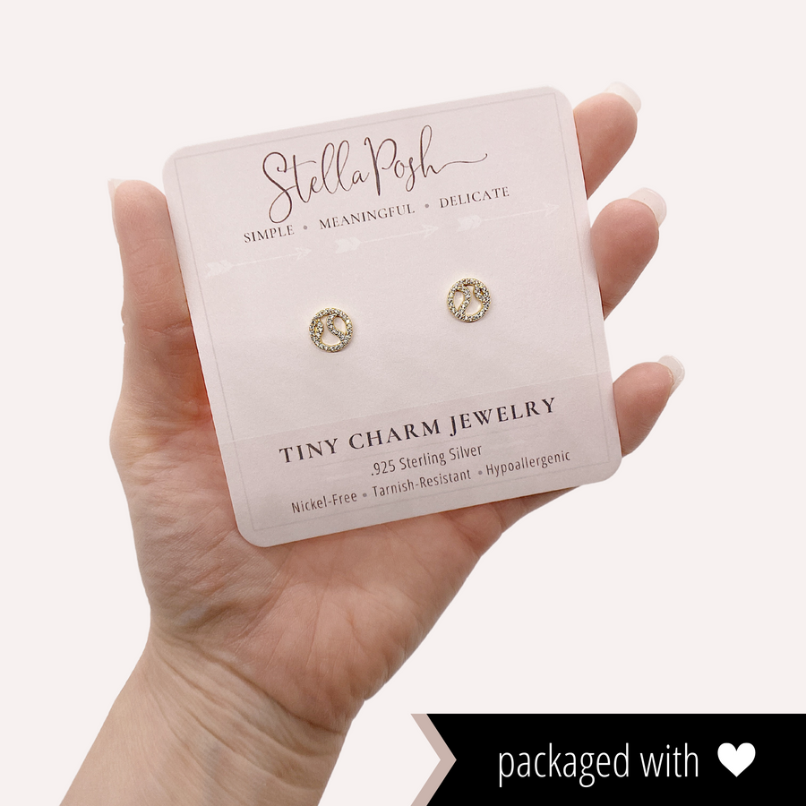 Tiny .925 Sterling Silver Tennis Earrings with premium cubic zirconia stones in a pavé setting, packaged with love.