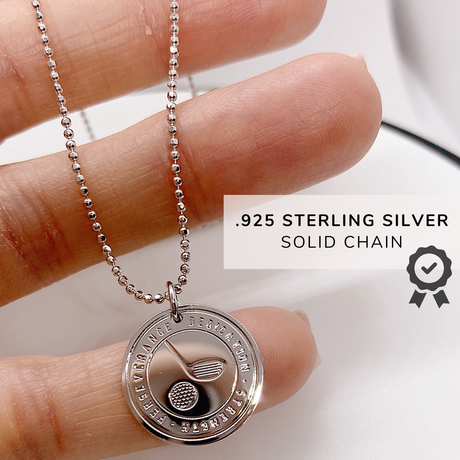 Dainty Golf Charm Necklace with Golf charm, and 'She believed she could so she did' charm, on a .925 sterling silver chain, either 14K Gold plated or Rhodium plated.