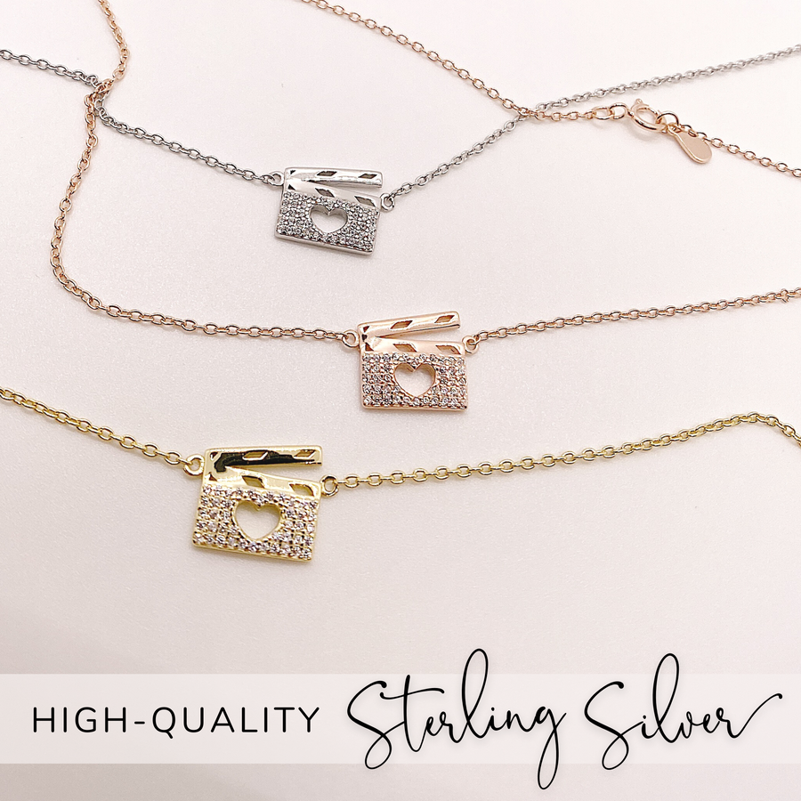 Drama Theatre .925 silver necklace with premium cubic zirconias in silver, gold, and rose gold.