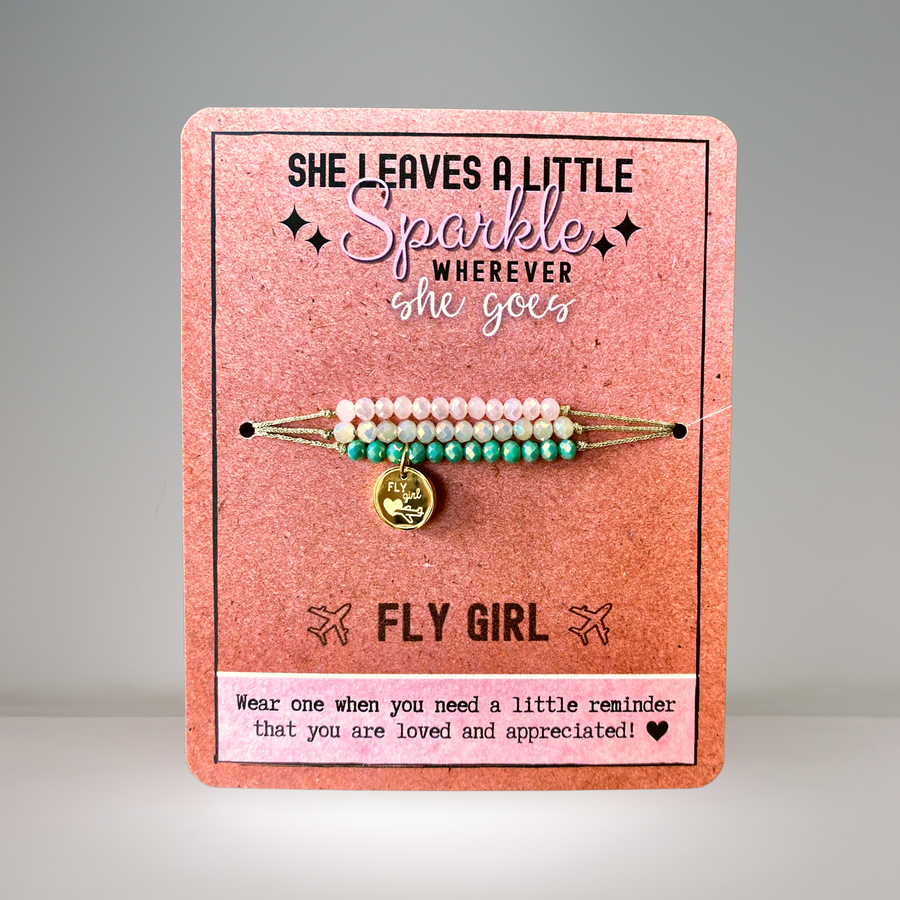 Fly Girl Charm Bracelet Set with 14K Gold plated 'Fly Girl' charm.