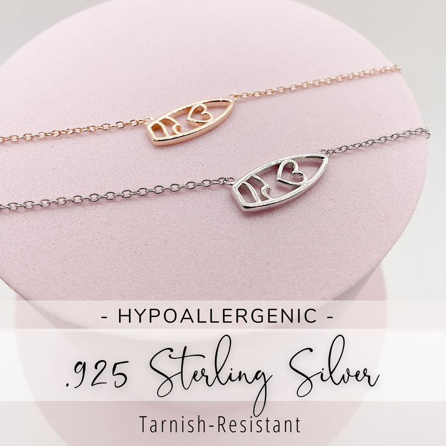 .925 silver Surfboard Necklaces in silver and gold.