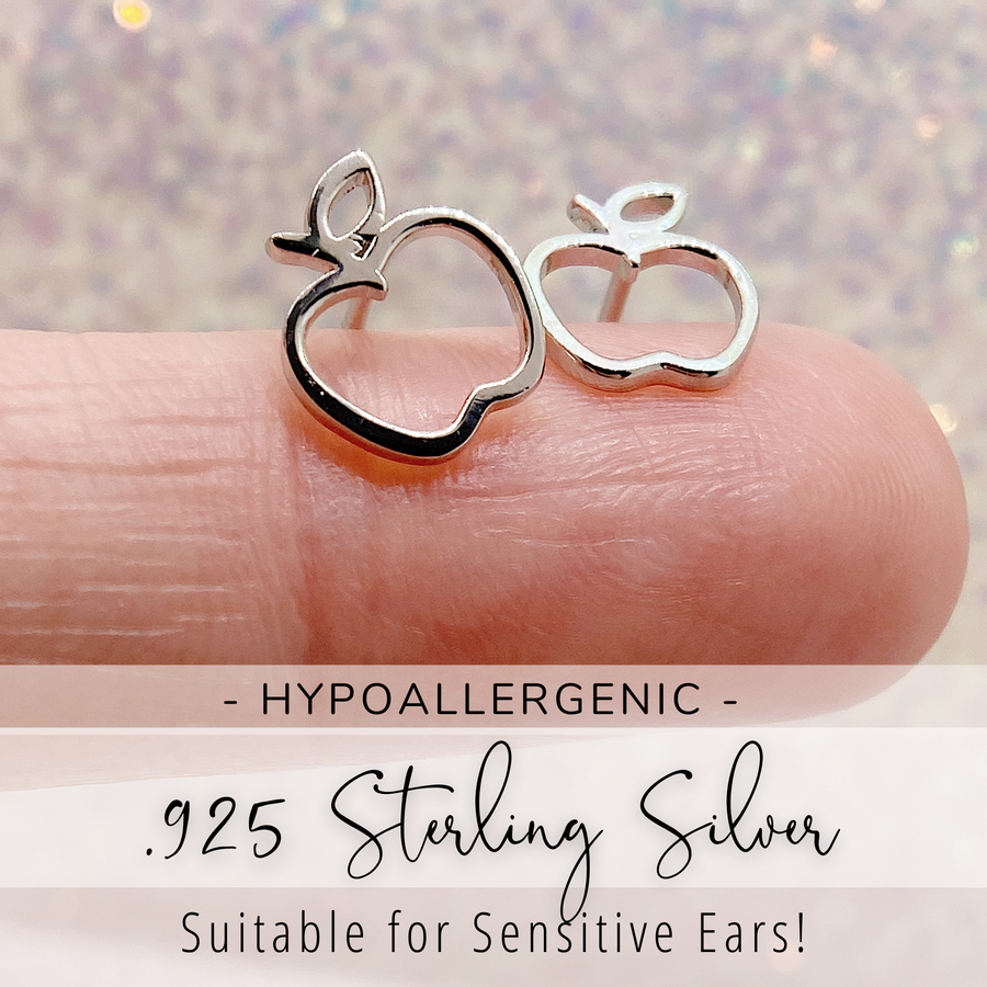 Dainty .925 Sterling Silver hypoallergenic Apple Earrings, 14K Gold, Rose Gold, or Rhodium plated, shown on finger for scale, a Great Teacher Gift. 