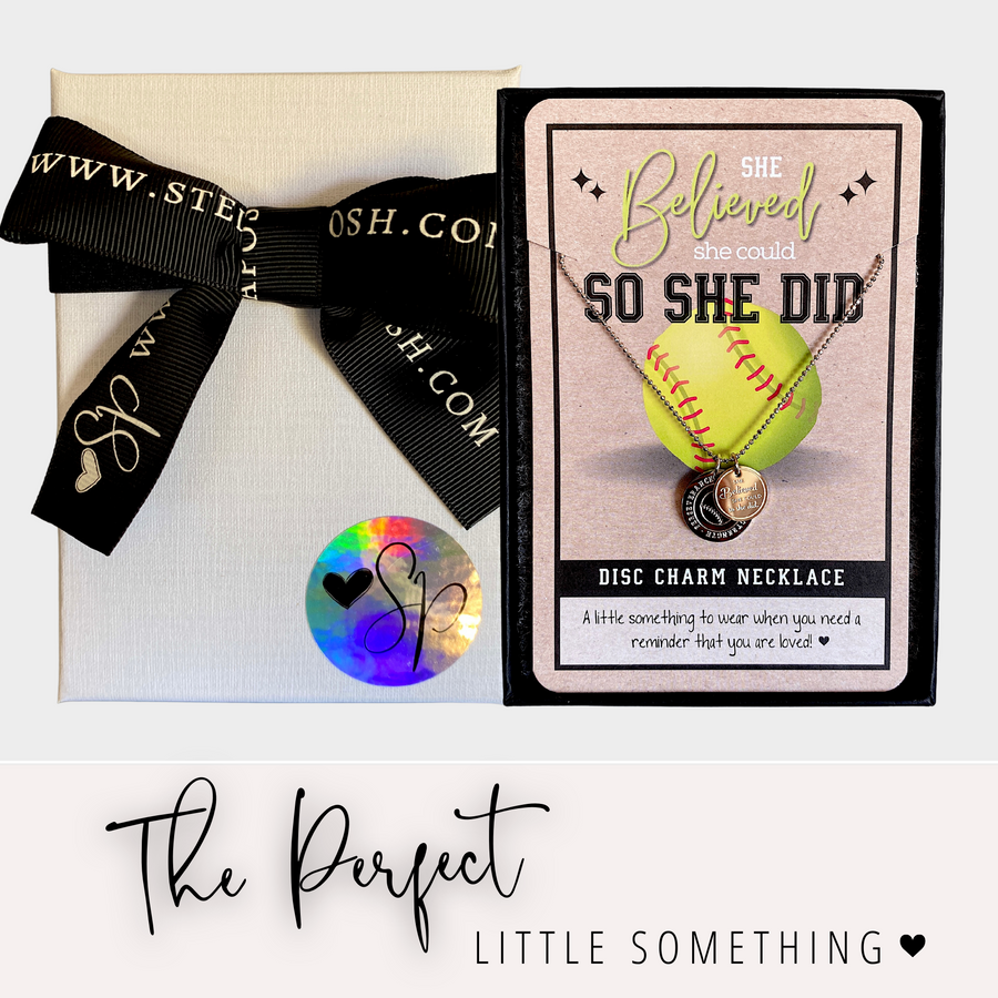 Dainty Softball Charm Necklace with 14K Gold plated or Rhodium plated 'Softball' charm, and 'She believed she could so she did' charm, with gift package, 'The Perfect Little Something'.