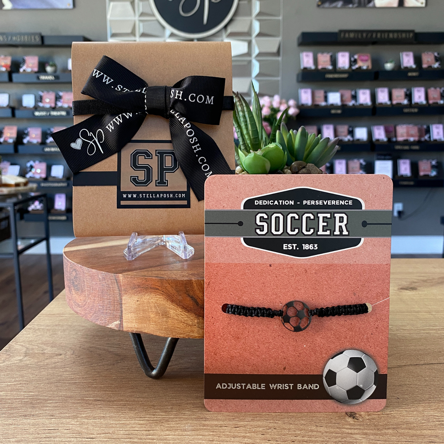 Soccer adjustable unisex wristband, mounted and ready for gift giving.