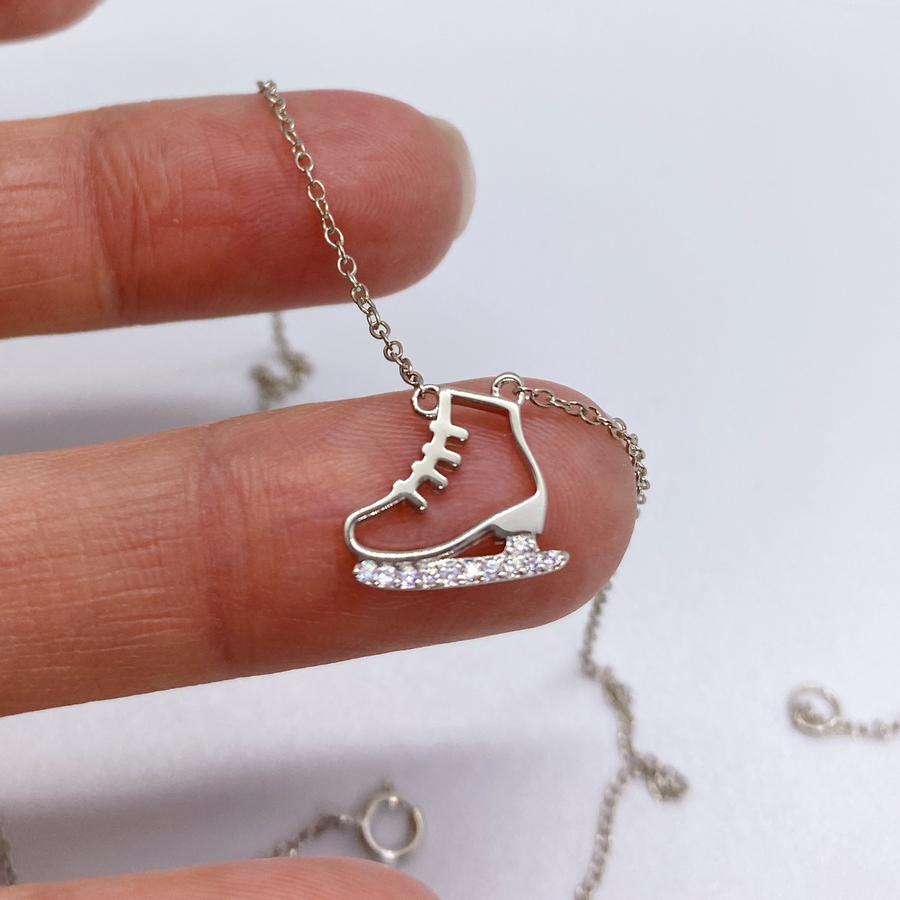.925 silver Dainty Ice Skate Necklace with premium cubic zirconias in a pavé setting.