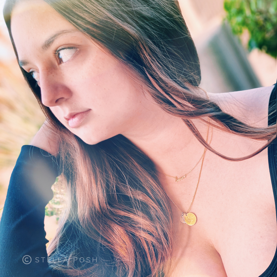 Teen Model wearing .925 silver Dance Necklace, layered with Charm Necklace.