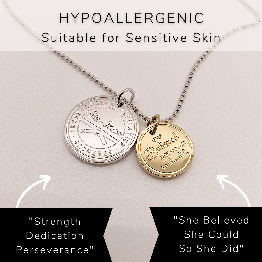 Hypoallergenic Jiu Jitsu Charm Necklace with '14K Gold plated or Rhodium plated Jiu Jitsu' charm, and 'She believed she could so she did' charm, on a .925 sterling silver chain, either 14K Gold plated or Rhodium plated.