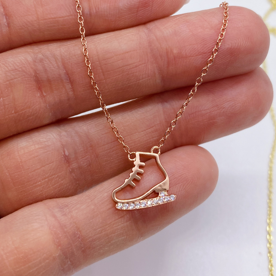.925 silver Dainty Ice Skate Necklace with premium cubic zirconias in a pavé setting, in rose gold.