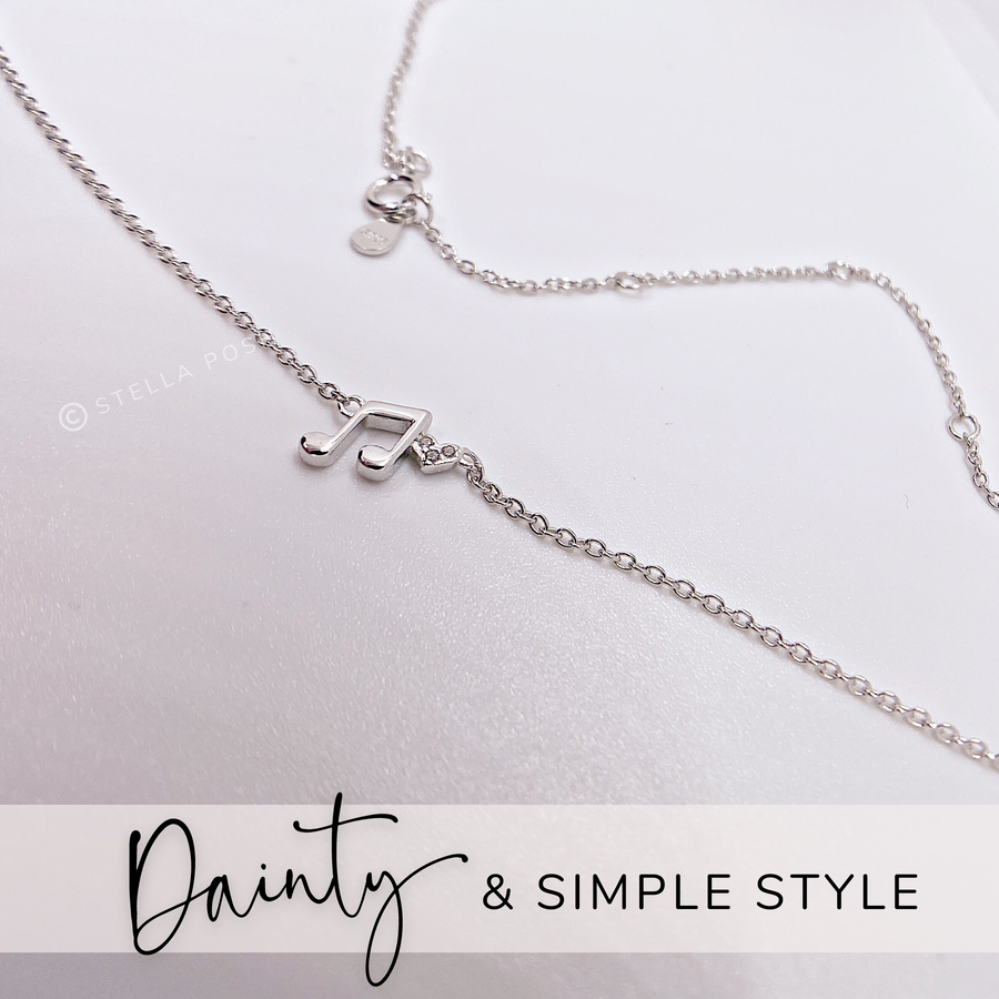 Tiny .925 silver Music Note Necklace with premium cubic zirconias.