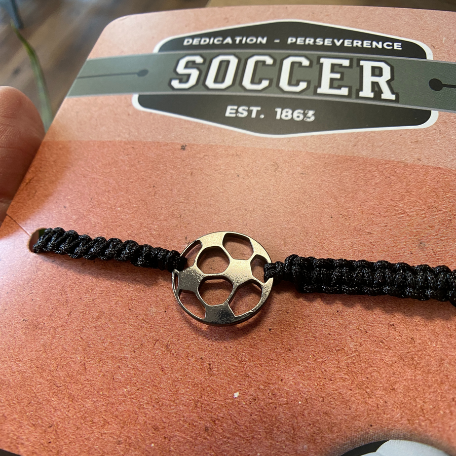 Soccer adjustable unisex wristband, mounted and ready for gift giving.