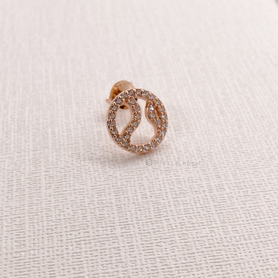 Tiny .925 Sterling Silver Tennis earring with premium cubic zirconia stones in a pavé setting, in rose gold.