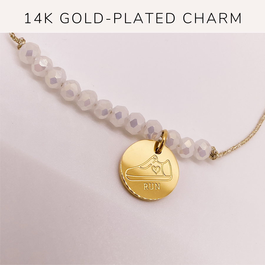 Track and Field Life Charm Bracelet with 14K Gold plated 'Run Shoe' charm.