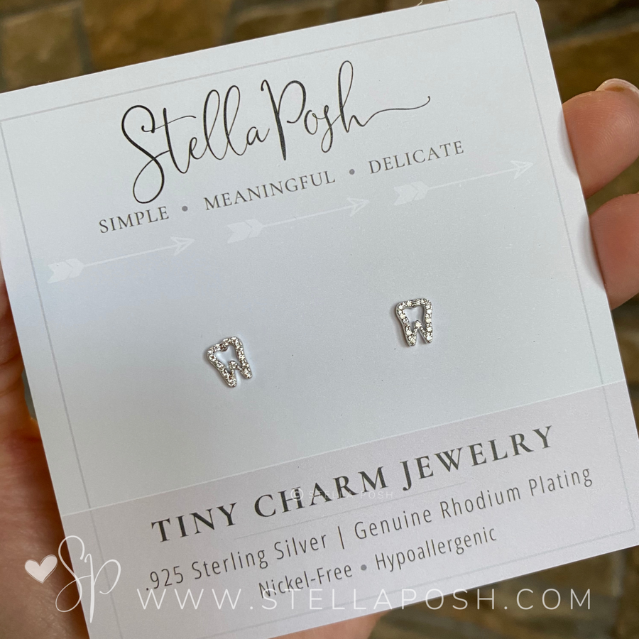 Tiny .925 Sterling Silver Tooth Earrings with premium cubic zirconia stones in a pavé setting, mounted on a premium card.