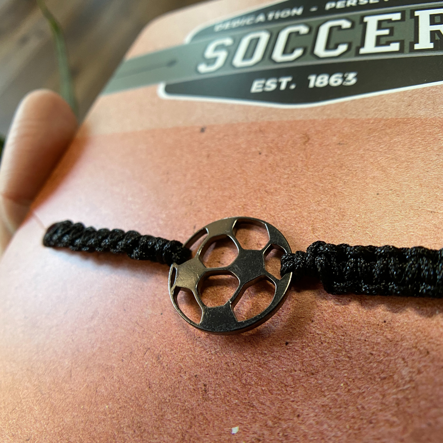 Soccer adjustable unisex wristband, mounted and ready for gift giving.