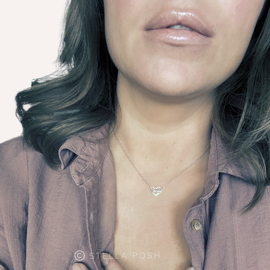 Model wearing Dainty .925 silver Swim Necklace with premium cubic zirconias.