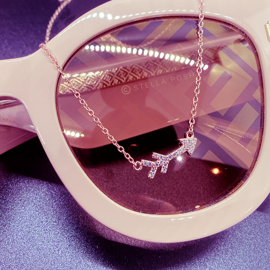 Tiny Arrow .925 Sterling Silver necklace with premium cubic zirconias in a pavé setting.