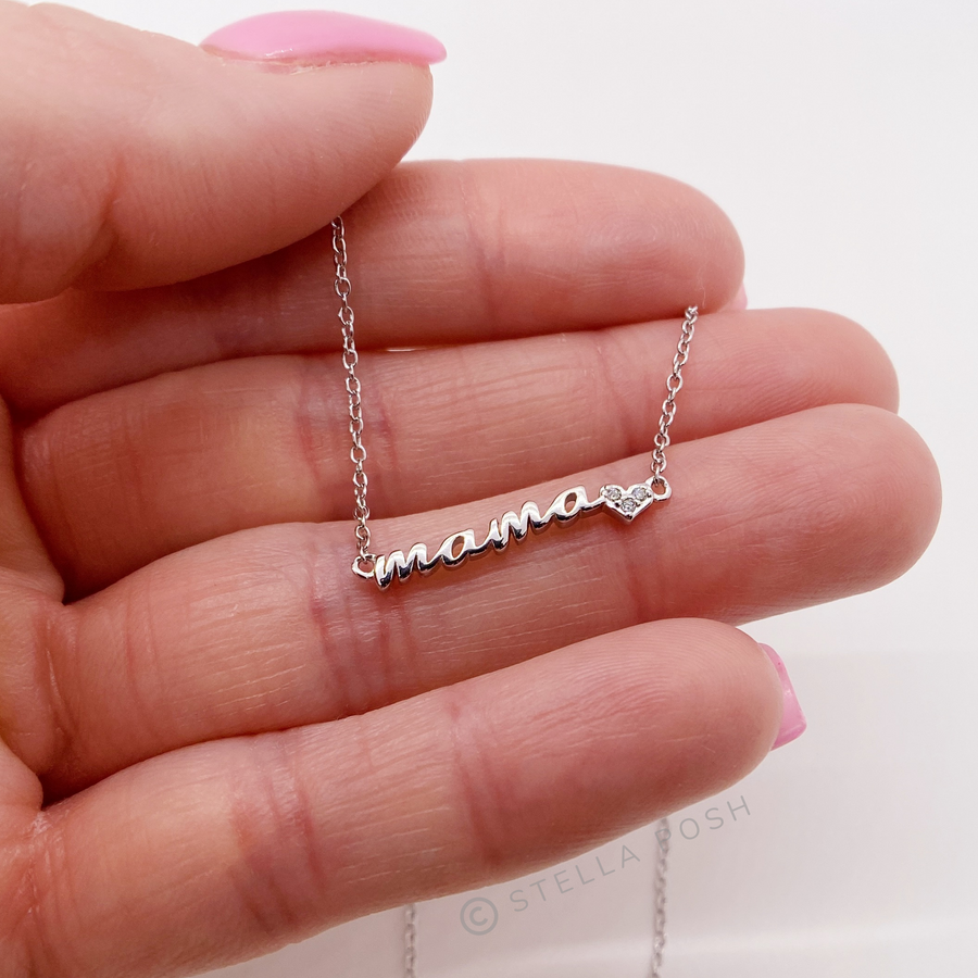 Dainty .925 silver Mama Necklace with premium cubic zirconias, Held in Hand for Scale.