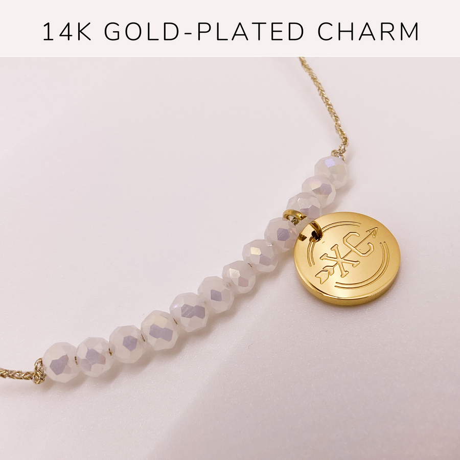 Cross Country Life Charm bracelet with 14K Gold plated 'Cross Country' charm.