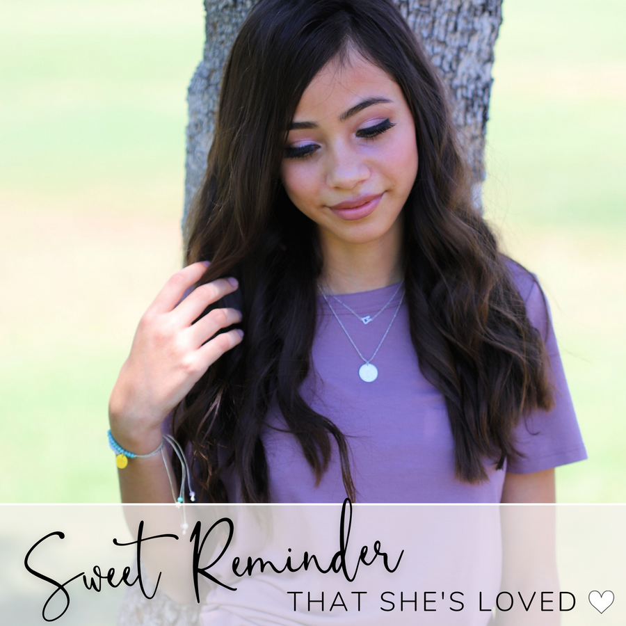 Model wearing bracelets, and layered necklaces; A Sweet Reminder That She's Loved!