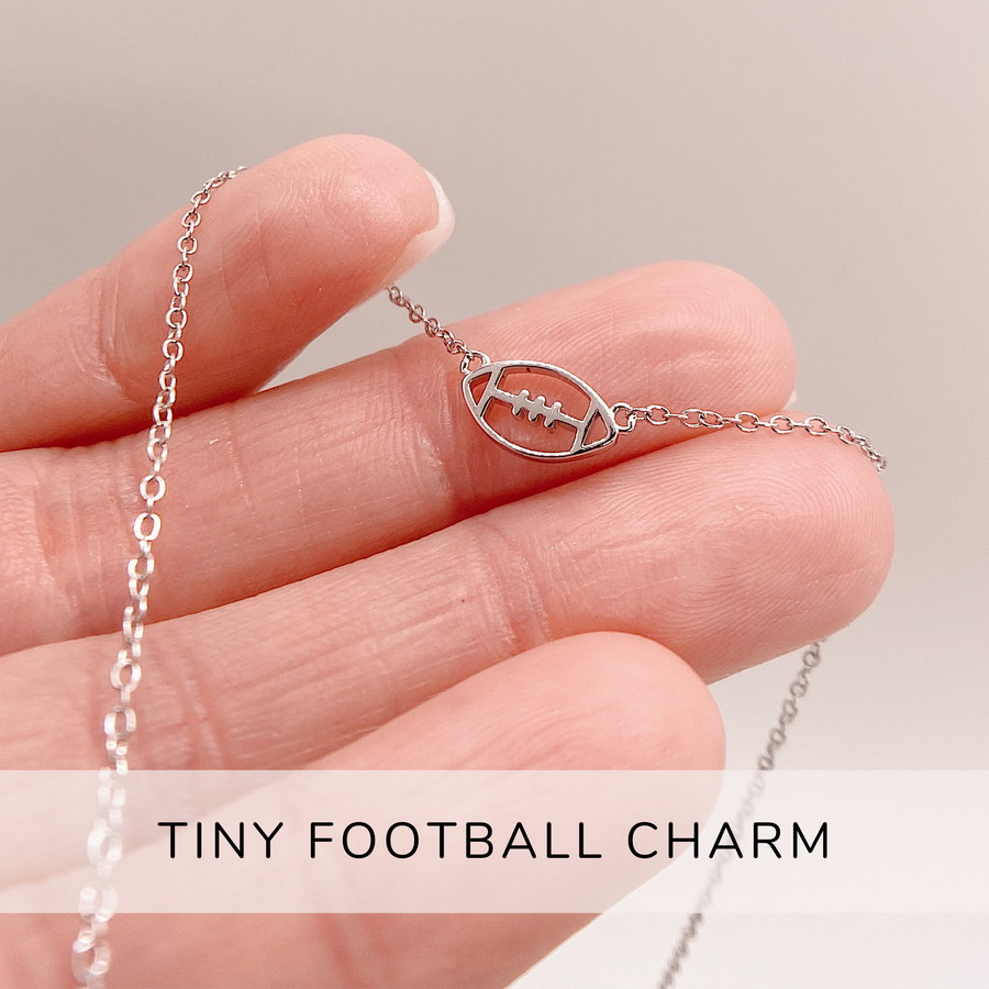 Tiny .925 silver Football necklace.