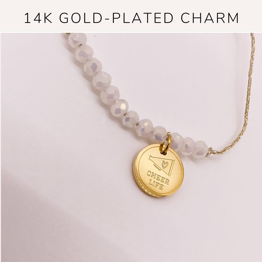 Cheer Life Charm Bracelet with 14K Gold plated 'Cheer Life' charm.