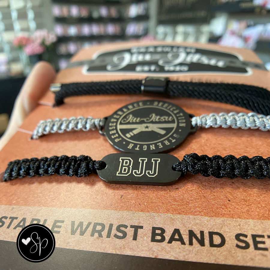 Jiu Jitsu adjustable wristbands set, mounted and ready for gift giving.