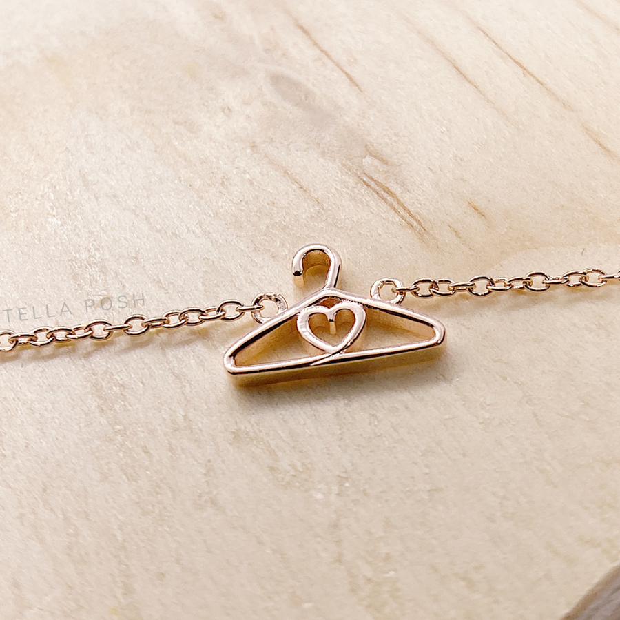 .925  silver minimalist Hanger Necklace in gold.