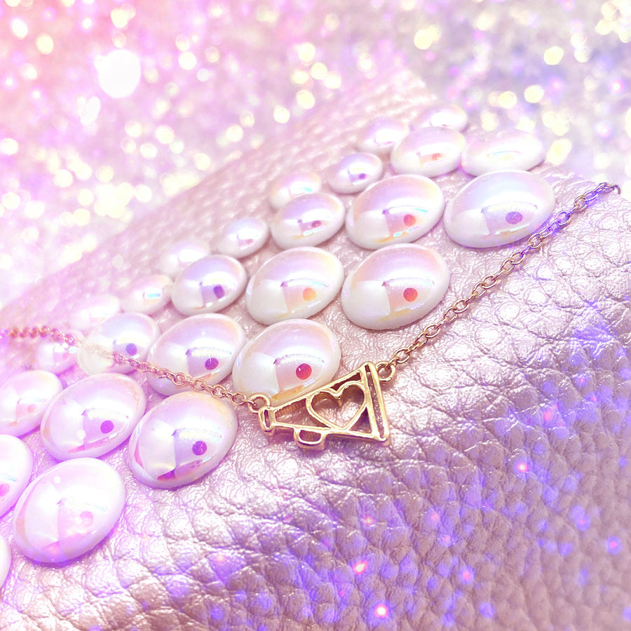 Tiny 925 silver Dainty .925 silver Cheer Necklace in gold.