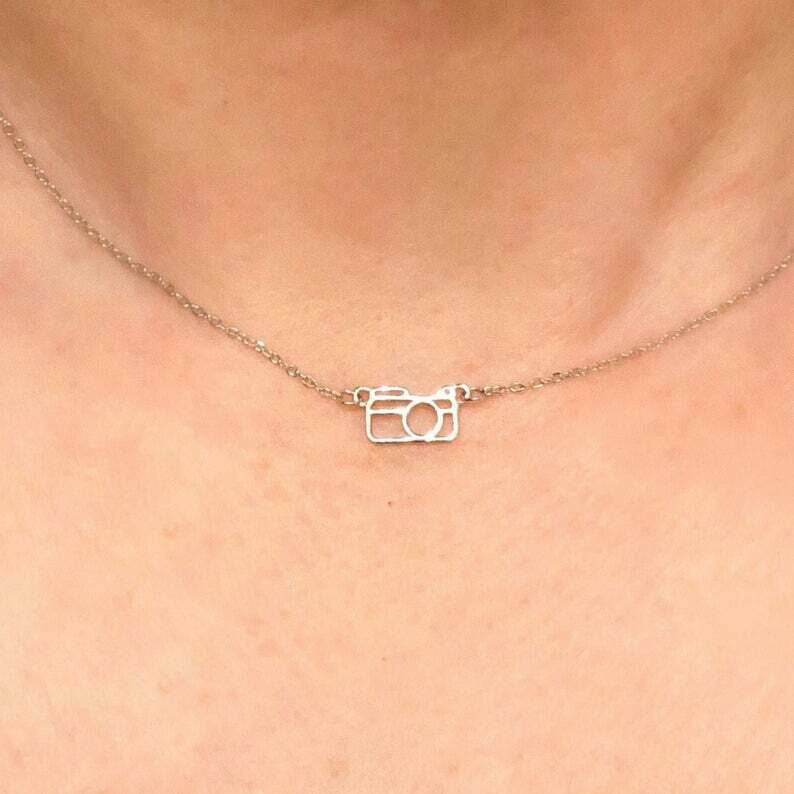 Model wearing Dainty .925 Sterling Silver Camera Necklace.