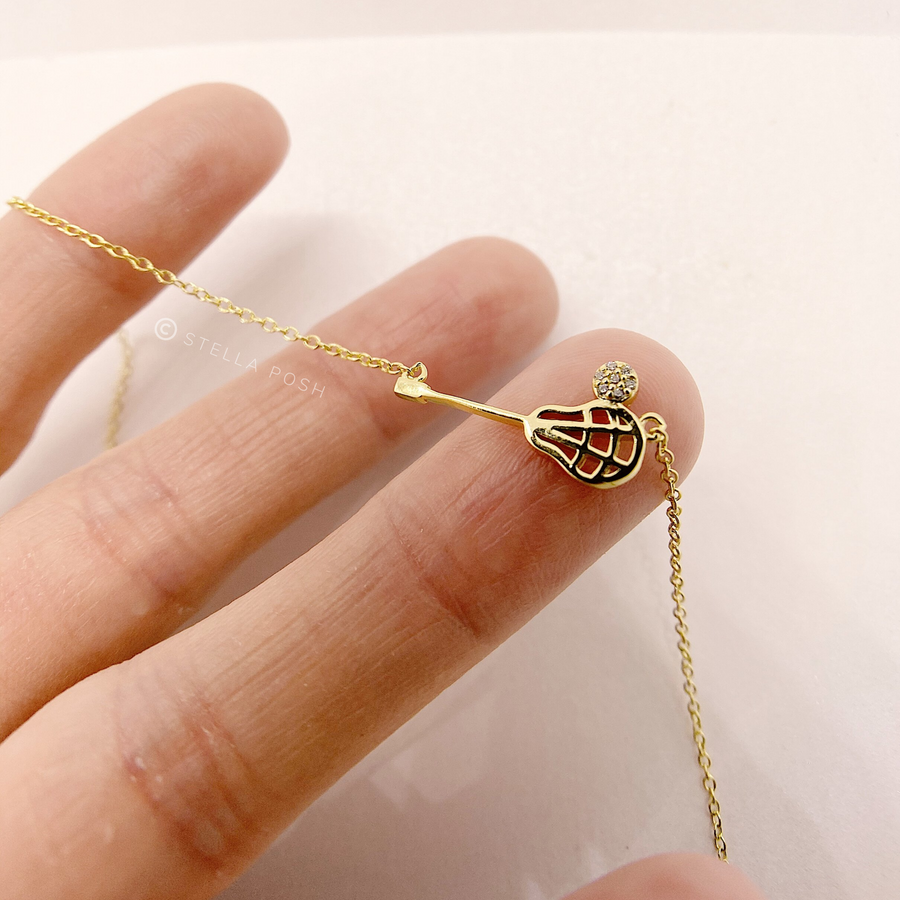 Dainty Lacrosse .925 silver Necklace Held in Hand for Scale.