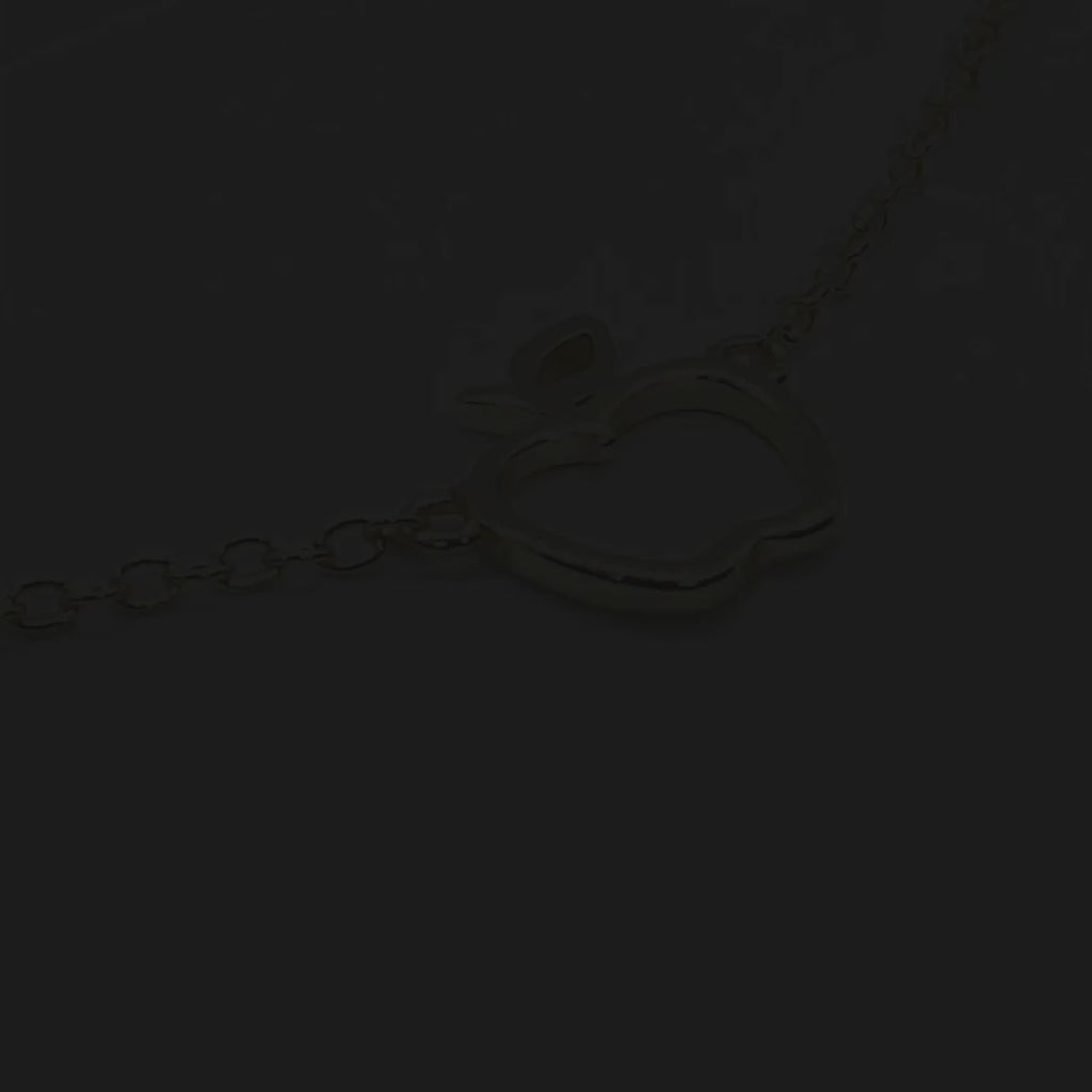 Video with tiny and dainty .925 silver Apple Necklaces in gold, silver, and rose gold.