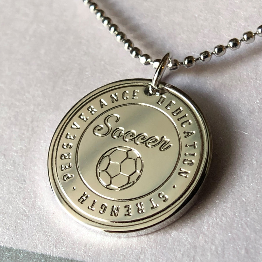 Rhodium plated Soccer charm.