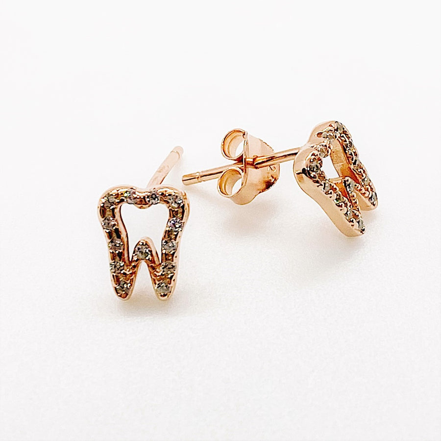 Tiny .925 Sterling Silver Tooth Earrings with premium cubic zirconia stones in a pavé setting, in rose gold.