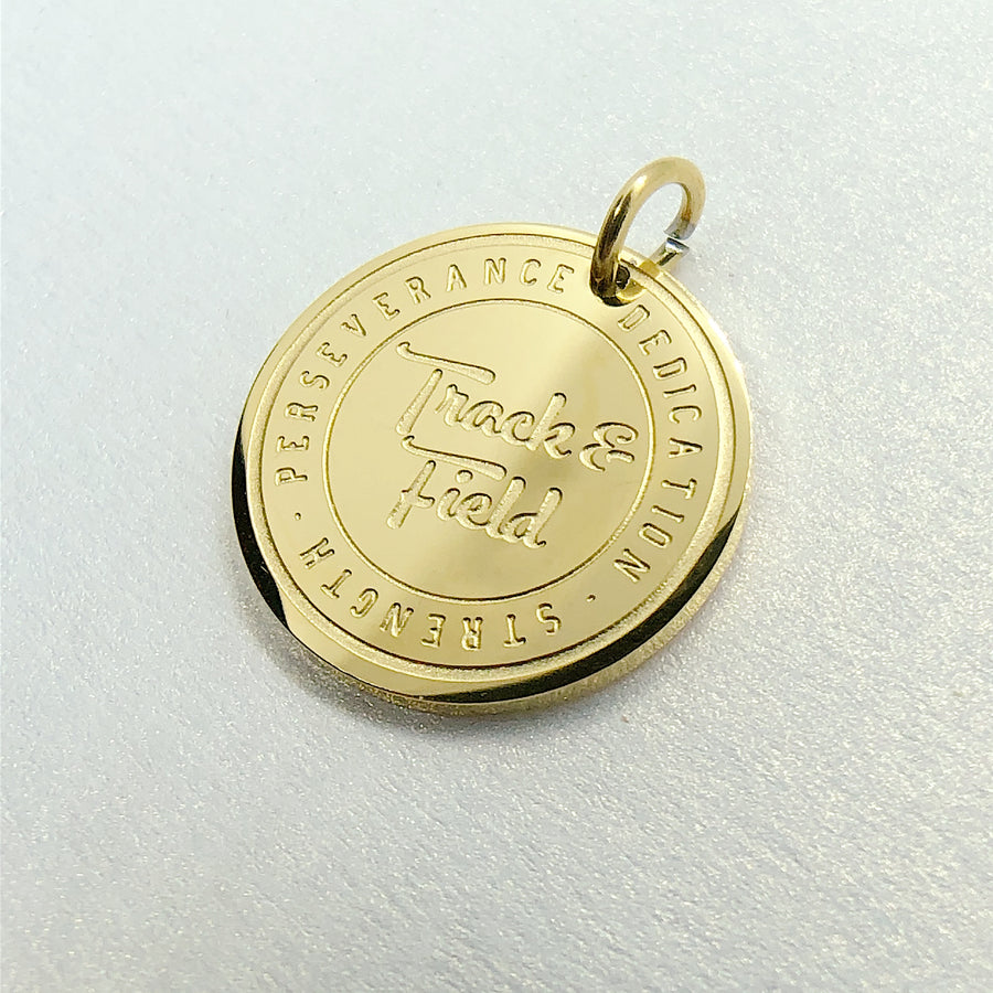 Detailed 14K Gold plated Track and Field charm.